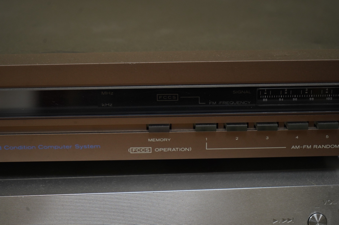 An Esoteric RZ-1 Integrated Music System, amplifier SACD/CD player, together with a Hitachi FT-5500 AM/FM stereo tuner, plus cables.